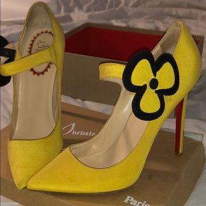 Christian Louboutin yellow and black heels
